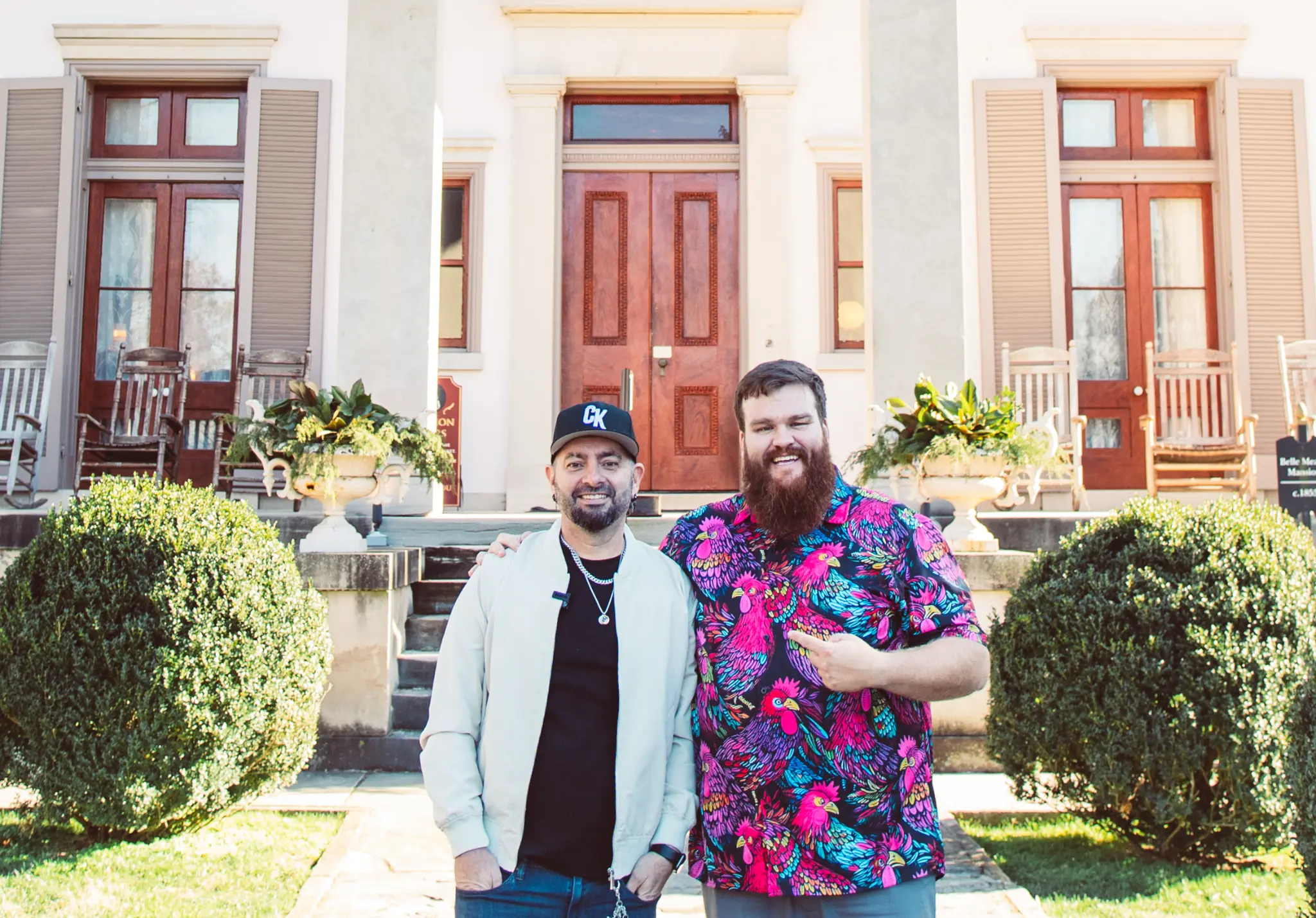 Stuart and guest at historic mansion